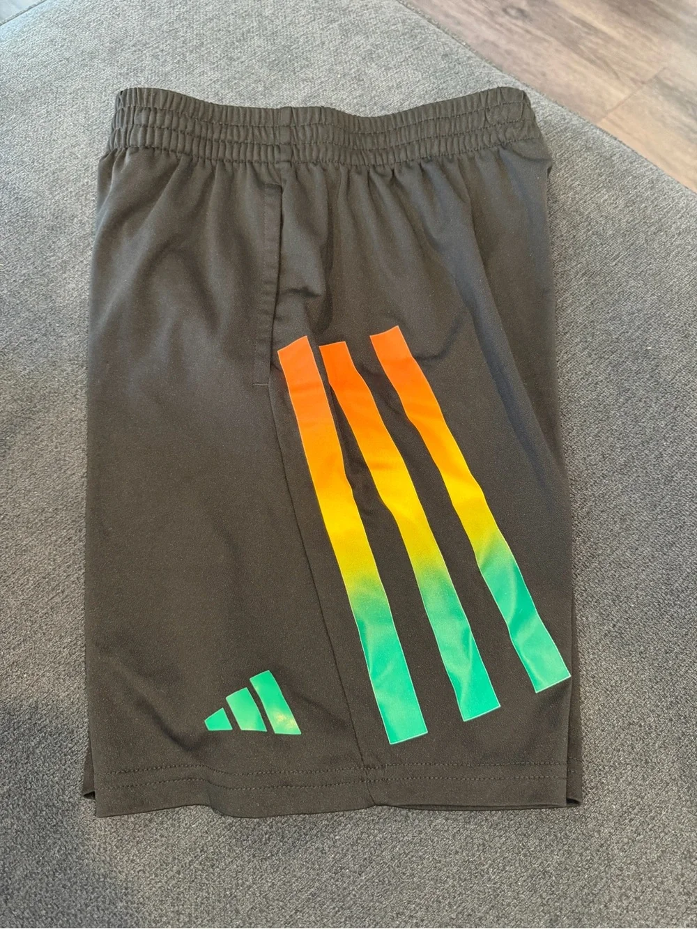 Adidas Black Athletic Shorts with Orange, Yellow, and Green Accents